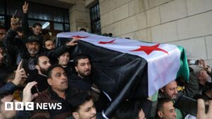 ‘I wish he’d lived to see new Syria’: Crowds bury anti-Assad activist