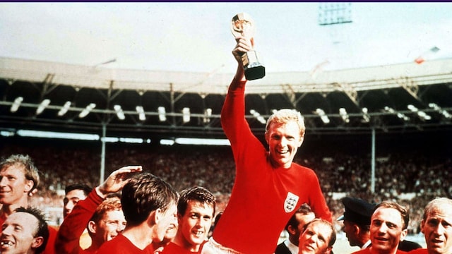 This is the most iconic image from the 1966 World Cup. Pictured here is England captain Bobby Moore who is on the shoulders of his teammates and is holding aloft the Jules Rimet trophy. 