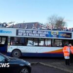 Double decker bus roof torn off in Kilmarnock bridge crash