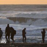 Winter winds bring deadly surf conditions and tornadoes to US