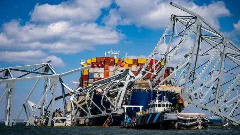 Getty Images A tugboat near the M/V Dali in the Patapsco River in Maryland just days after the collision took place. 