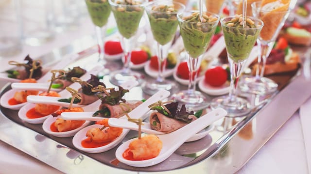 1. Appetizers | Some of the popular appetizers that you can consider serving before your main course include chicken salt and pepper, malai chaap, cheese cutlet, chilli chicken, spiced nuts, cheese platter, stuffed mushroom or even shrimp cocktail. (Image: Shutterstock)