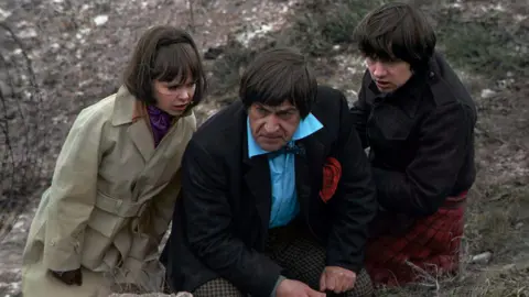 BBC The Doctor (Patrick Troughton) and his companions, Jamie McCrimmon (Frazer Hines) and Zoe Heriot (Wendy Padbury) in colourised scene from 1969 story The War Games