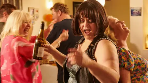 BBC/Toffee International Ltd./Tom Jackson Gavin (MATHEW HORNE), Pam (ALISON STEADMAN), Smithy (JAMES CORDEN), Nessa (RUTH JONES), Stacey (JOANNA PAGE) in the finale of Gavin & Stacey