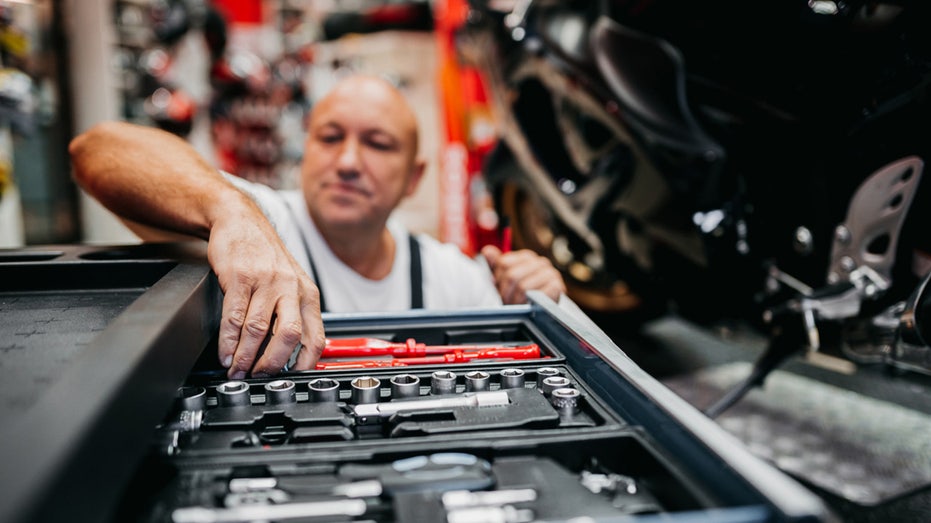 mechanic and tools in garage