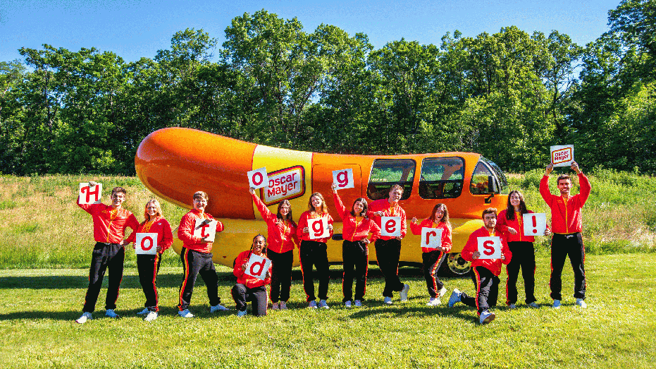 Hotdoggers in front of the Wienermobile