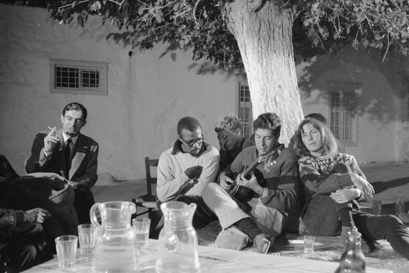 Charmian Clift and American poet Charles Heckstall with Cohen in Hydra in October 1960.