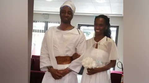 West Midlands Police Tai and Naiyahmi Yasharahyalah on their wedding day wearing white clothes