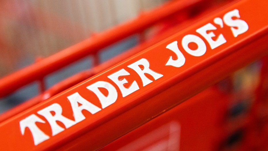 A signage on a shopping cart at Trader Joe's