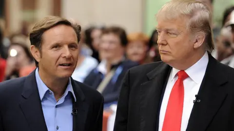 Getty Images Mark Burnett (left) with Trump in 2010