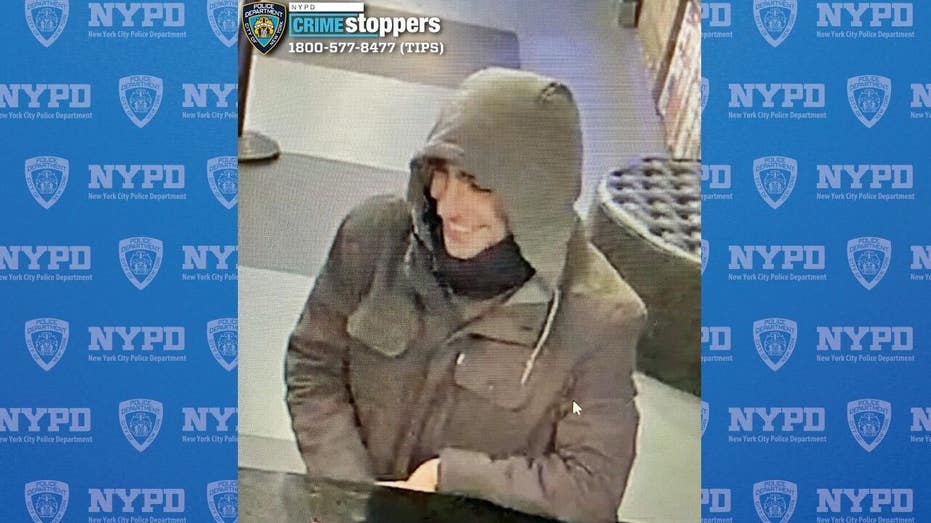 A screenshot from surveillance footage released by the NYPD shows an alleged person of interest wanted in connection for the shooting death of UnitedHealthcare CEO Brian Thompson in Midtown Manhattan on Wednesday, December 4, 2024.