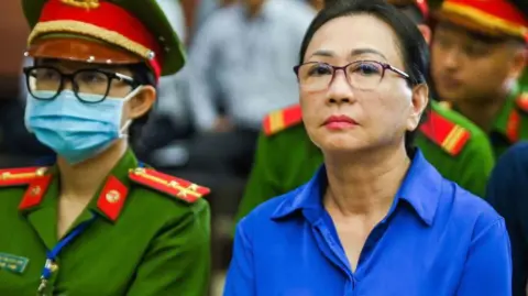 Getty Images Truong My Lan looks on at a court in Ho Chi Minh City