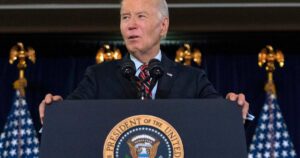 Biden signs defense bill, despite ban on transgender health care for military kids