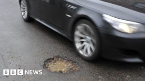 Local authorities given extra £500m to fix potholes