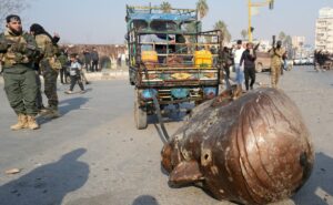 Statues Of Bashar Al-Assad’s Father Dragged Through Syria Roads