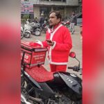 Delivery Man Made To Remove Santa Outfit