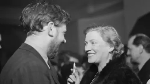 Getty Images Photographer Lee Miller, pictured with art critic Frederick Laws in 1950