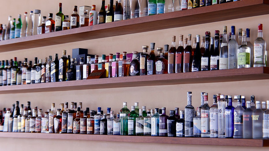 Liquor bottles on bar shelf