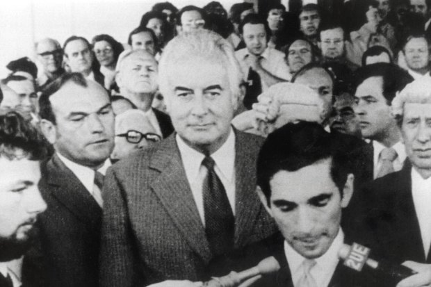 Watched by Gough Whitlam. David Smith, official secretary to the governor-general, reads the proclamation dissolving parliament following the dismissal of the Whitlam government in 1975.