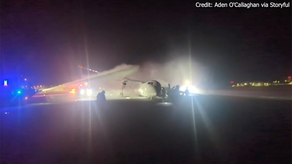 Plane fire being put out