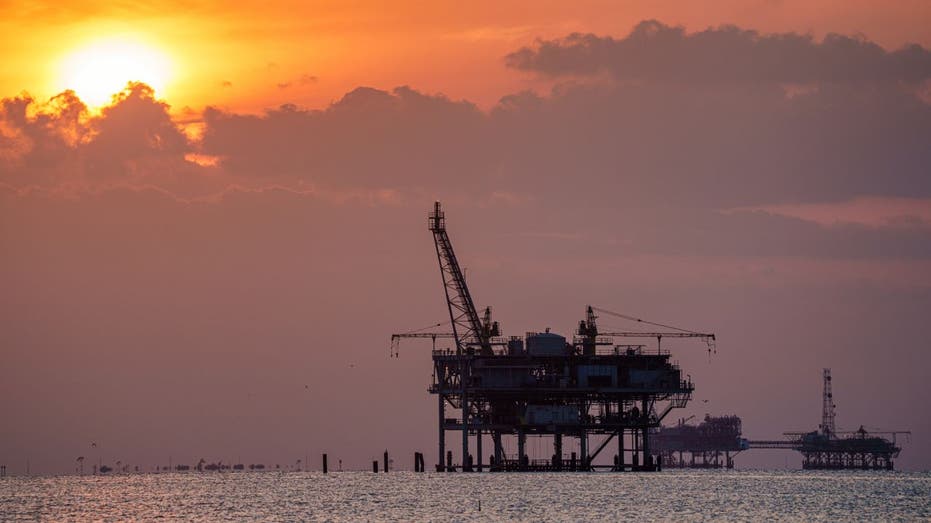 Oil rig at sunset