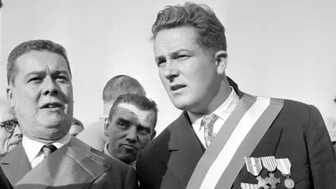 Getty Images Jean-Marie Le Pen at a veterans march in 1960