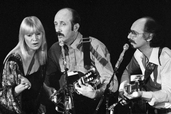 Mary Travers, Paul Stookey and Peter Yarrow perform at a Los Angeles benefit to aid to Cambodian refugees in 1980.