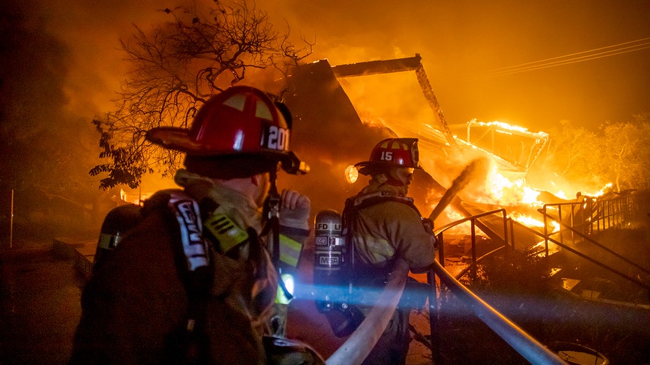 Firefighters battle fire