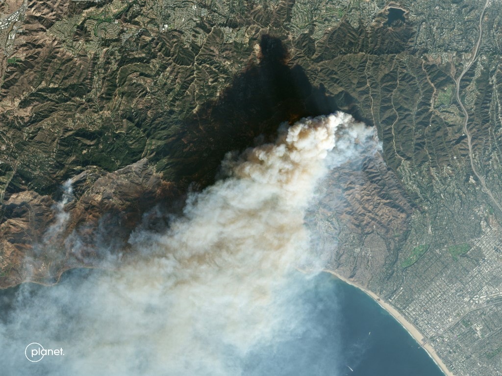 This satellite image released by Planet Labs PBC shows an overview of the Palisades Fire, in Pacific Palisades, a neighborhood of Los Angeles, California January 9, 2025. 