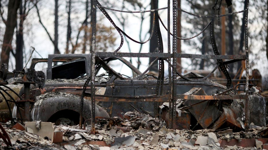 PARADISE , CA - NOVEMBER 27: A classic car destroyed by the Camp Fire is seen in the town of Paradise, Calif., on Tuesday, Nov. 27, 2018. Numerous safety issues resulting from the fire like downed power lines, road conditions, hazardous materials, hazard trees and more keep officials from re-opening the town to the public. (Photo by Anda Chu/Digital First Media/East Bay Times via Getty Images)