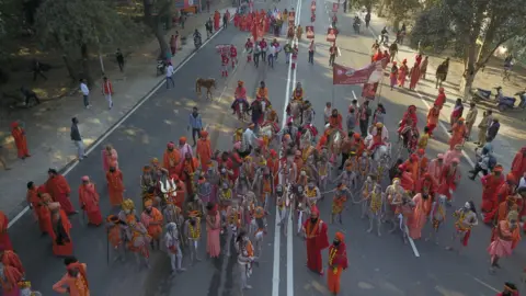 Ankit Srinivas Drone footage shows a group of Naga sadhus arriving at the Mela grounds in Prayagraj on Saturday 11th January