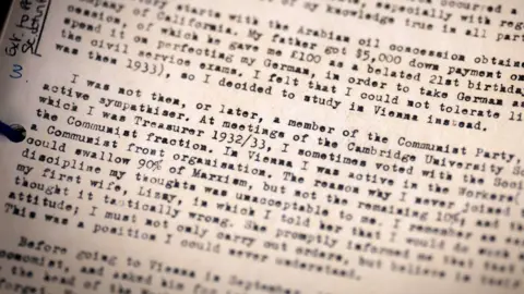 PA Media Text typed on a typewriter from a report from of one of the Anthony Blunt files.