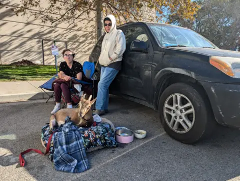 Roya Lavasani, standing, and her daughter, had lived in a Malibu condo building that they owned just a few days ago. Now they were taking shelter in the family car.