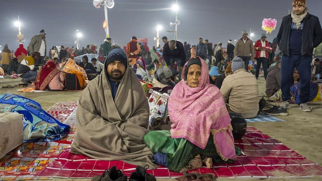 Braving the biting cold, devotees brimming with energy and enthusiasm converged at the Triveni Sangam to take a holy dip at the Maha Kumbh on Wednesday. Chants of 'Har Har Mahadev', 'Jai Shri Ram' and 'Jai Ganga Maiyya' were heard as the devotees took a dip in the bone-chilling water. (Image: AP)