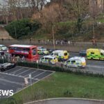 Police hunt killer of boy killed on London bus