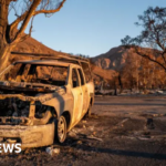 LA braces for stronger winds as fires continue to burn