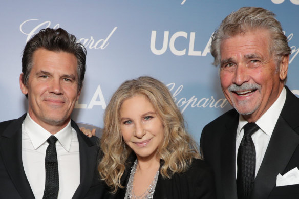 Josh Brolin, left, with his step-mother, Barbra Streisand, and father James in 2019.