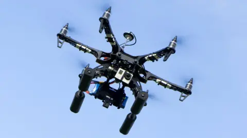 Getty Images A drone flying in the sky