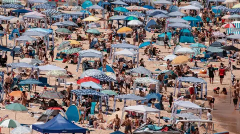 Tamara Toon Photography A drone shot of cabanas on Sydney's Freshwater Beach