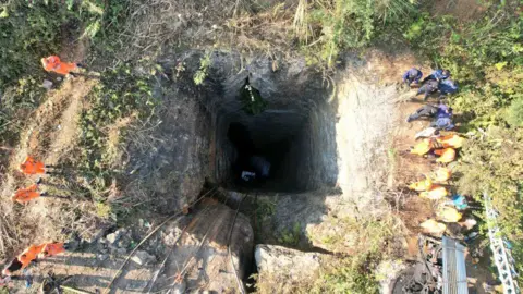 Defence PRO, Guwahati The picture shows a hole, dug dozens of feet inside the earth, in which miners descend to extract coal