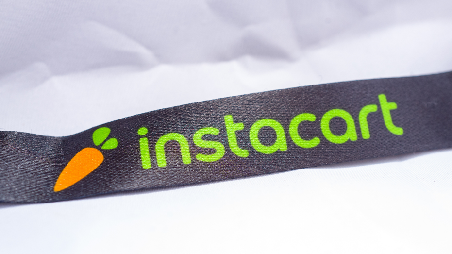 Instacart logo on worker