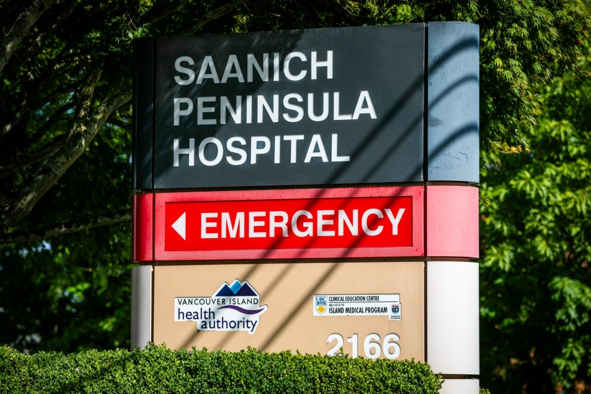 A sign that reads 'Saanich Peninsula Hospital' with the words "Emergency", "Vancouver Island Health Authority" and "2166" underneath. 