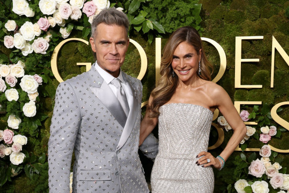 Robbie Williams and wife Ayda Field at the Golden Globes, where Better Man was nominated for best original song.