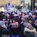 South Korea’s impeached president defies warrant after hourslong standoff