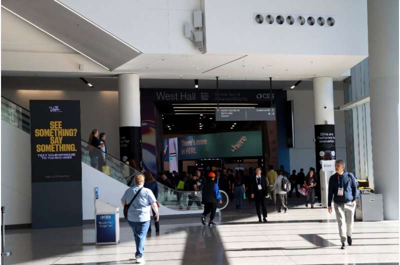 Attendees walk through the main entrance during the Consumer Electronics Show in Las Vegas on January 10, 2025