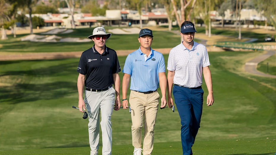 Joel Dahmen, John Pak and Beau Hossler walk