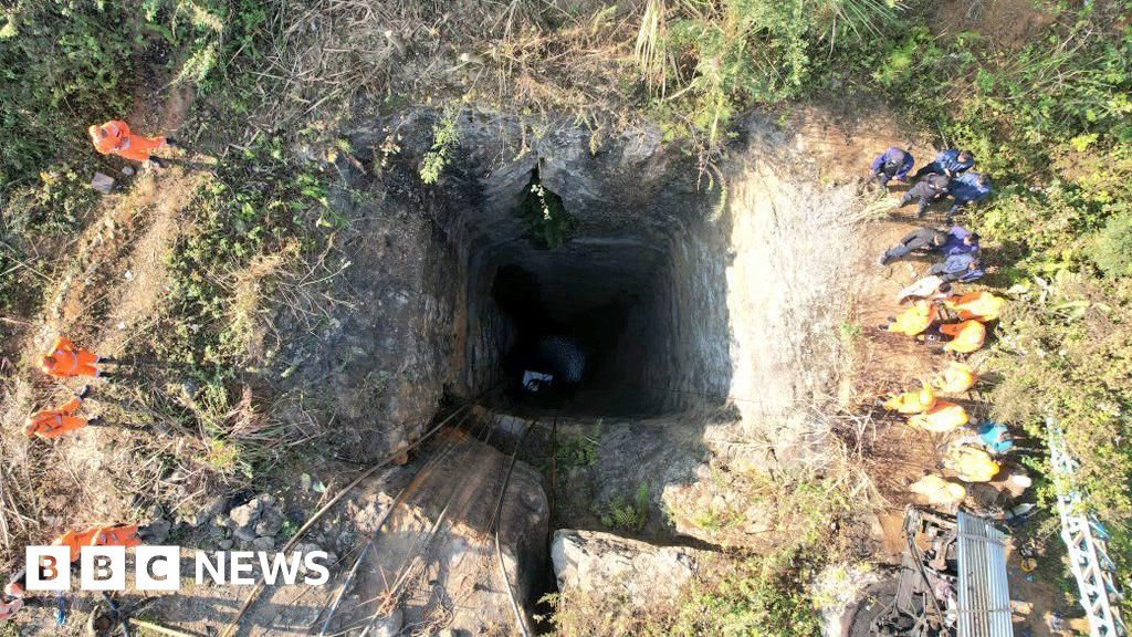 India rescuers race to save men stuck in flooded rat-hole mine