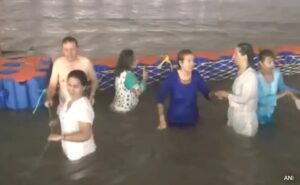 Foreigners Take Holy Dip As Maha Kumbh Begins