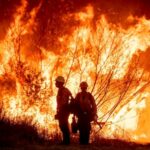 Families in shock begin to visit their charred homes in Los Angeles area