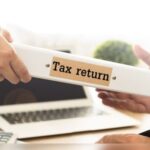 What are the consequences of not filing income tax returns on time?